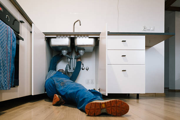 Professional Drain Cleaning technician working in Oxford, FL